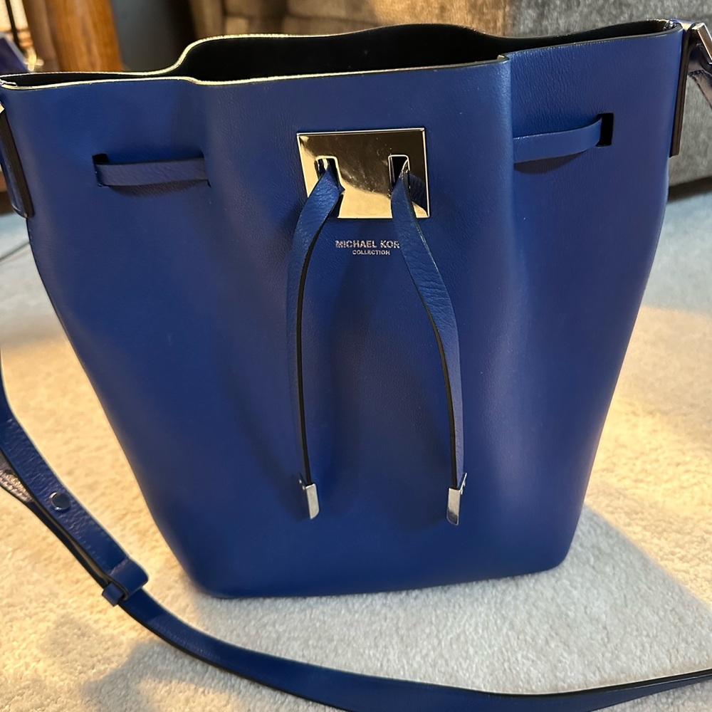 Michael Kors Handbag. Gently used. Color is a pretty blue.
